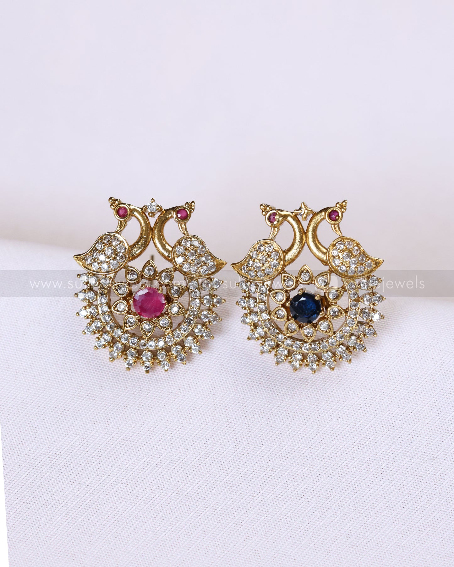 E1214 - 4 in 1 AD Peacock Changeable Stud