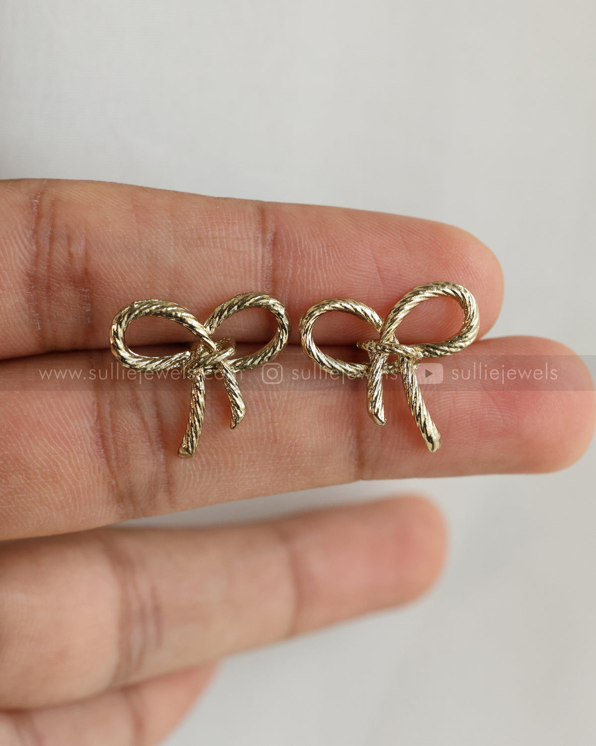 W150 - Golden Bow Knot Stud Earrings