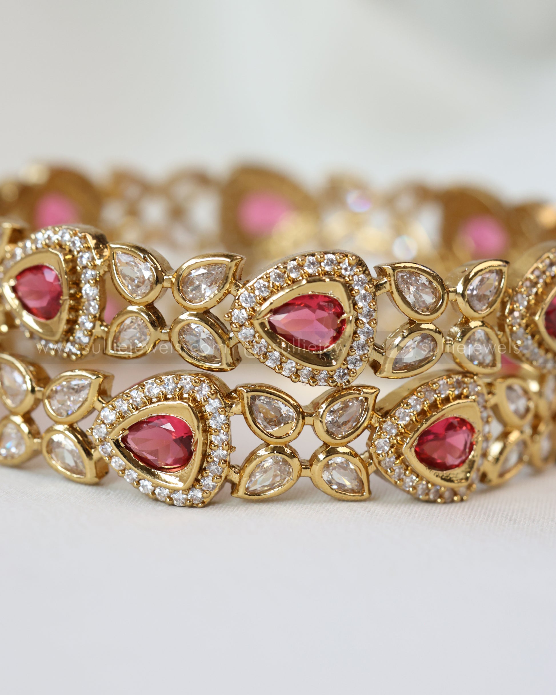 Triangular Bow Bangle 9021 - Ruby Premium Triangular Stone Bangle - Set of 2 – sulliejewels
