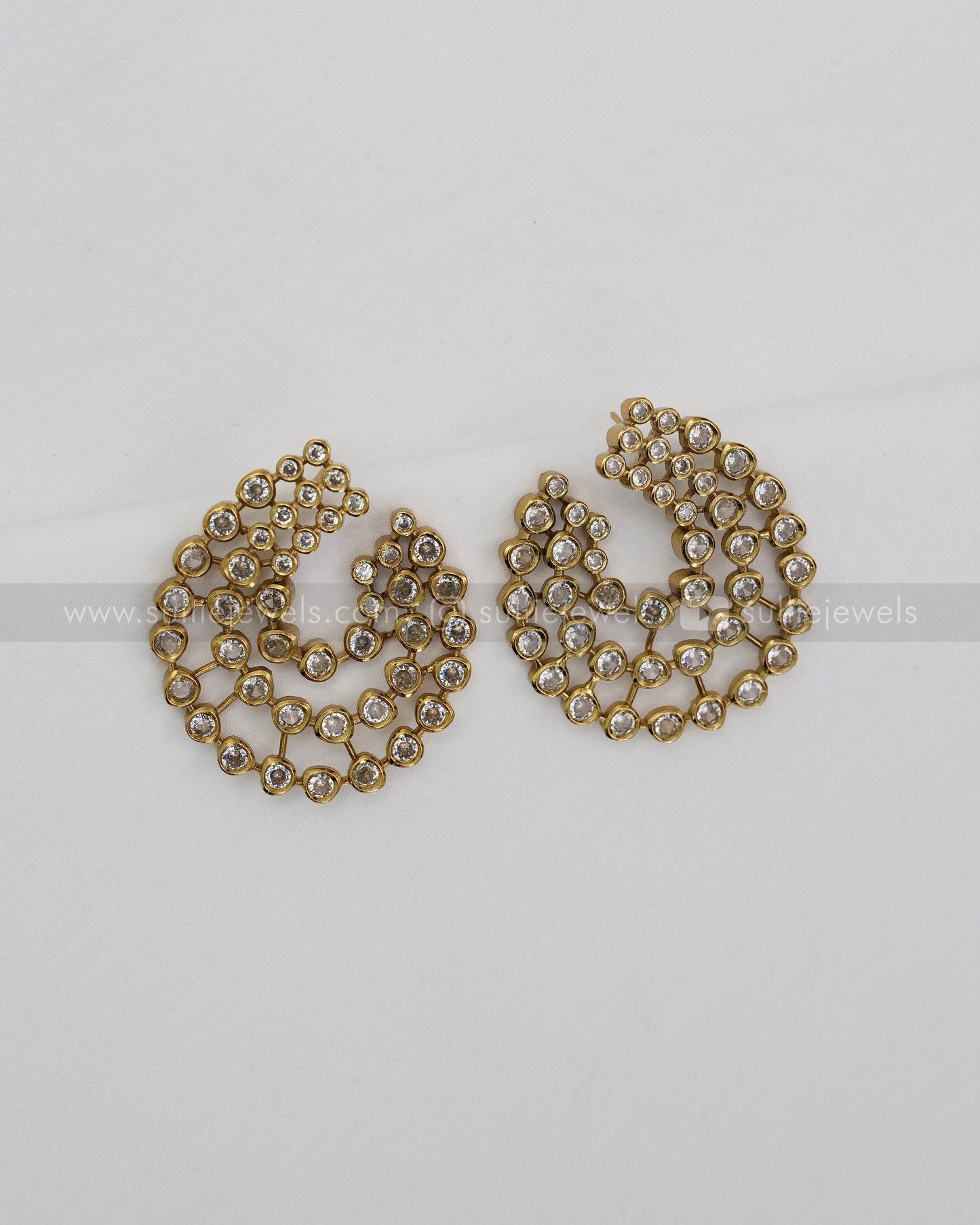 E1180 - Diamond Swirl Stud Earrings
