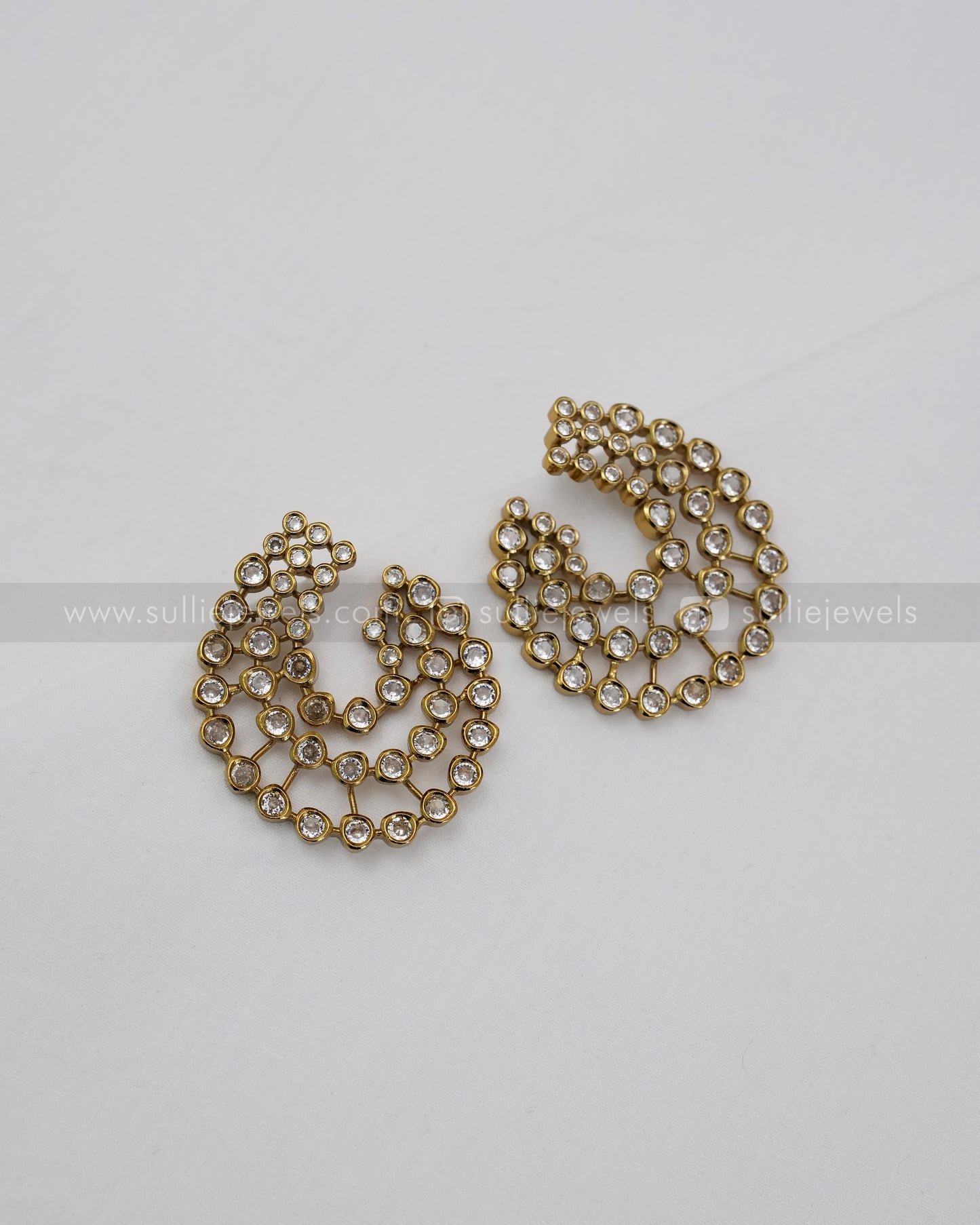 E1180 - Diamond Swirl Stud Earrings