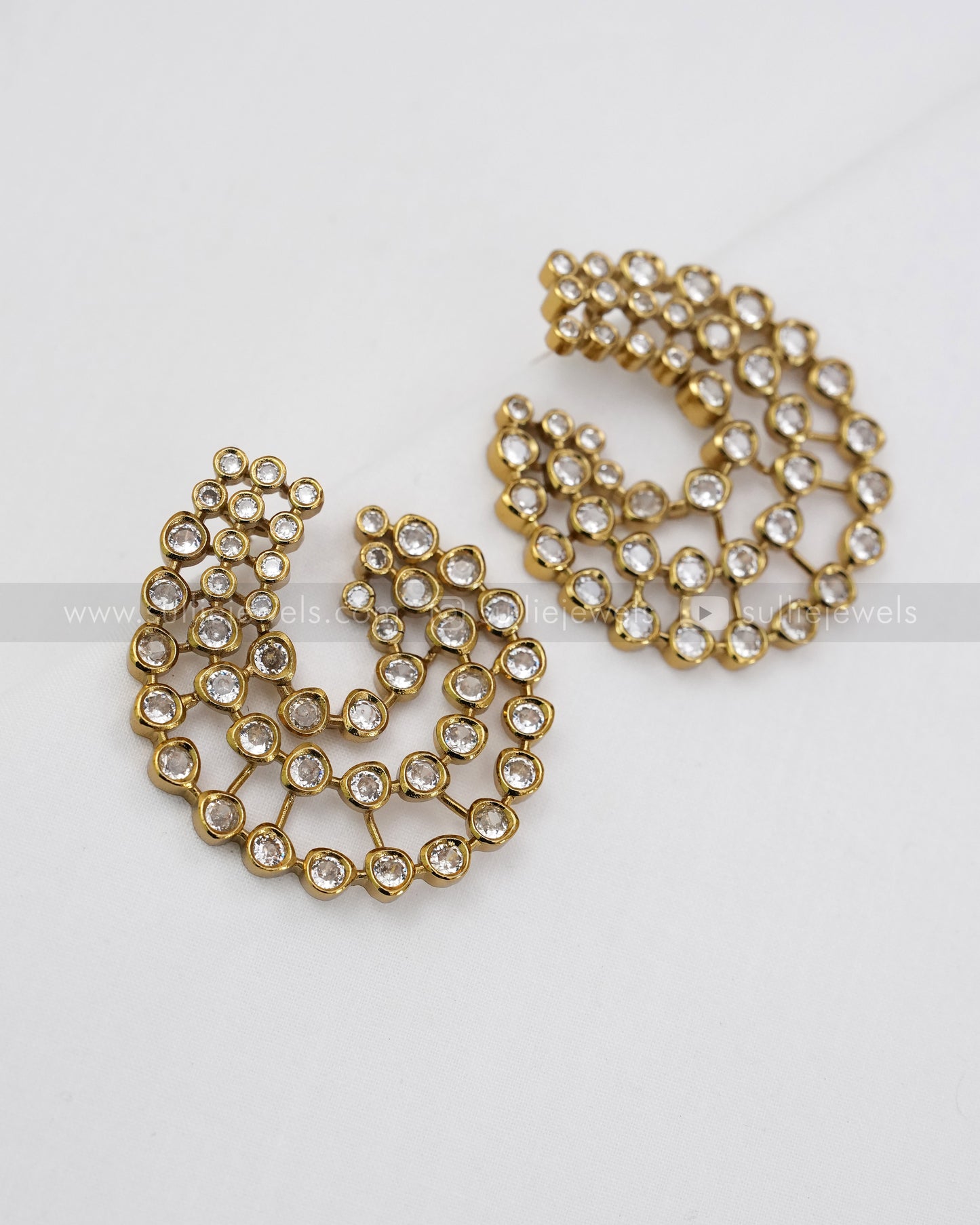 E1180 - Diamond Swirl Stud Earrings